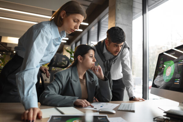 three employees in a meeting room, Salesforce Admin Training